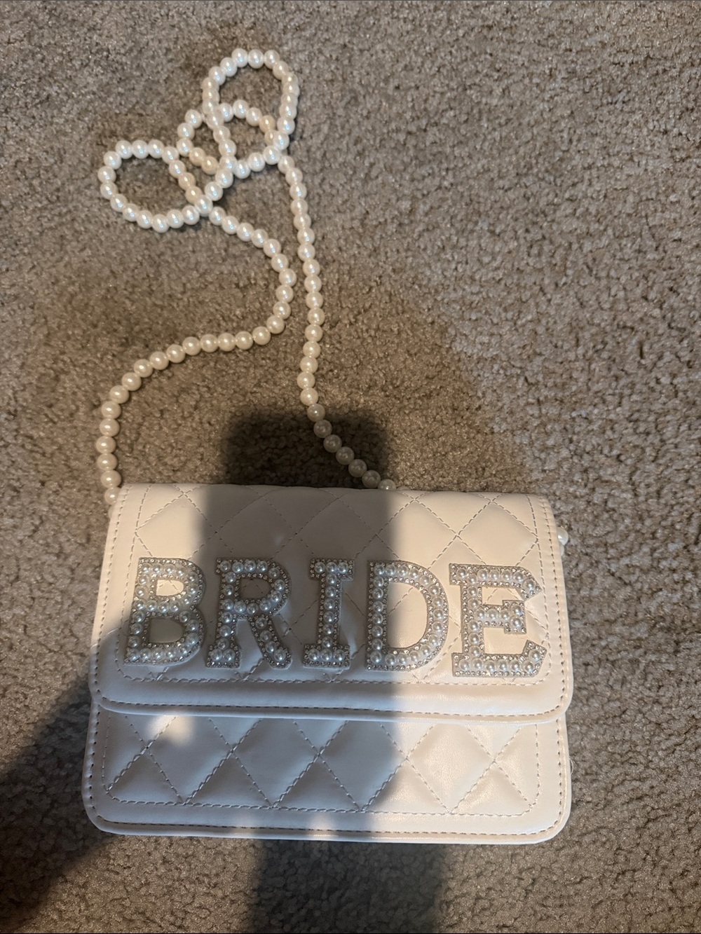 White Quilted Pearl-Handle Crossbody Bag with 'BRIDE' Rhinestone Detail